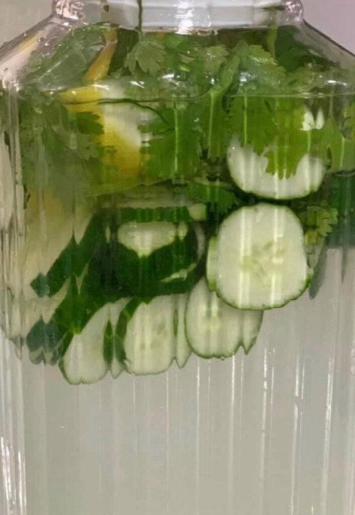 Miracle Water, cucumber, lemon and parsley and roots